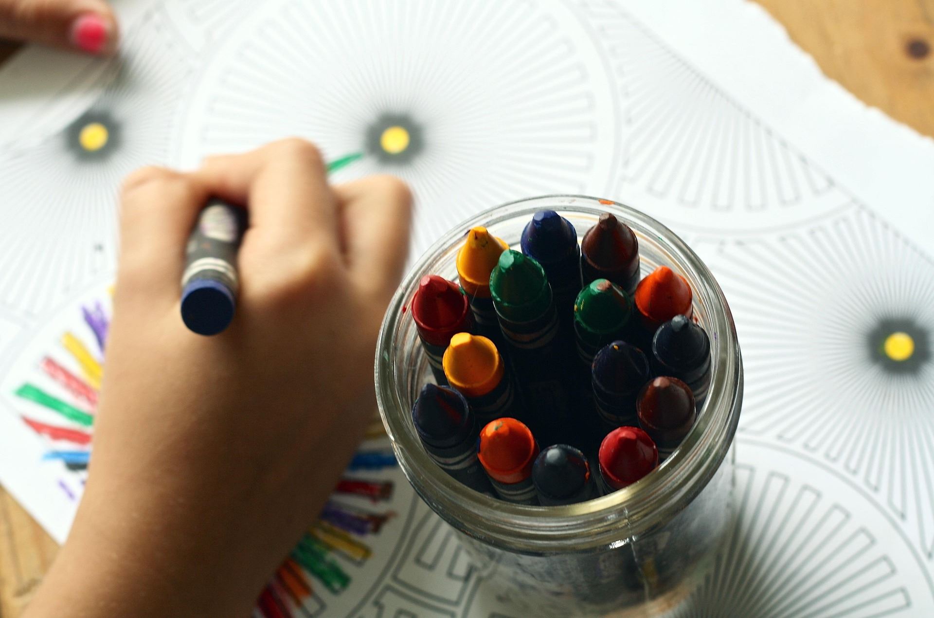 Kid coloring a page