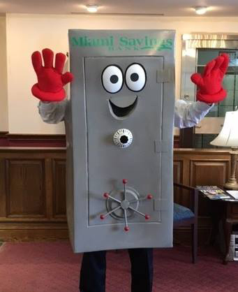 person dressed in a bank safe costume