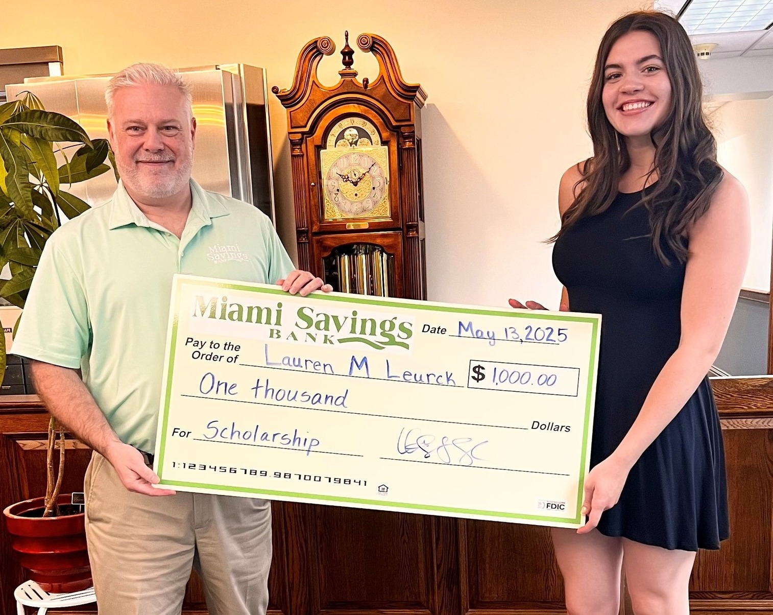 2025 Scholarship Winner pictured (right) and Bank President (left)